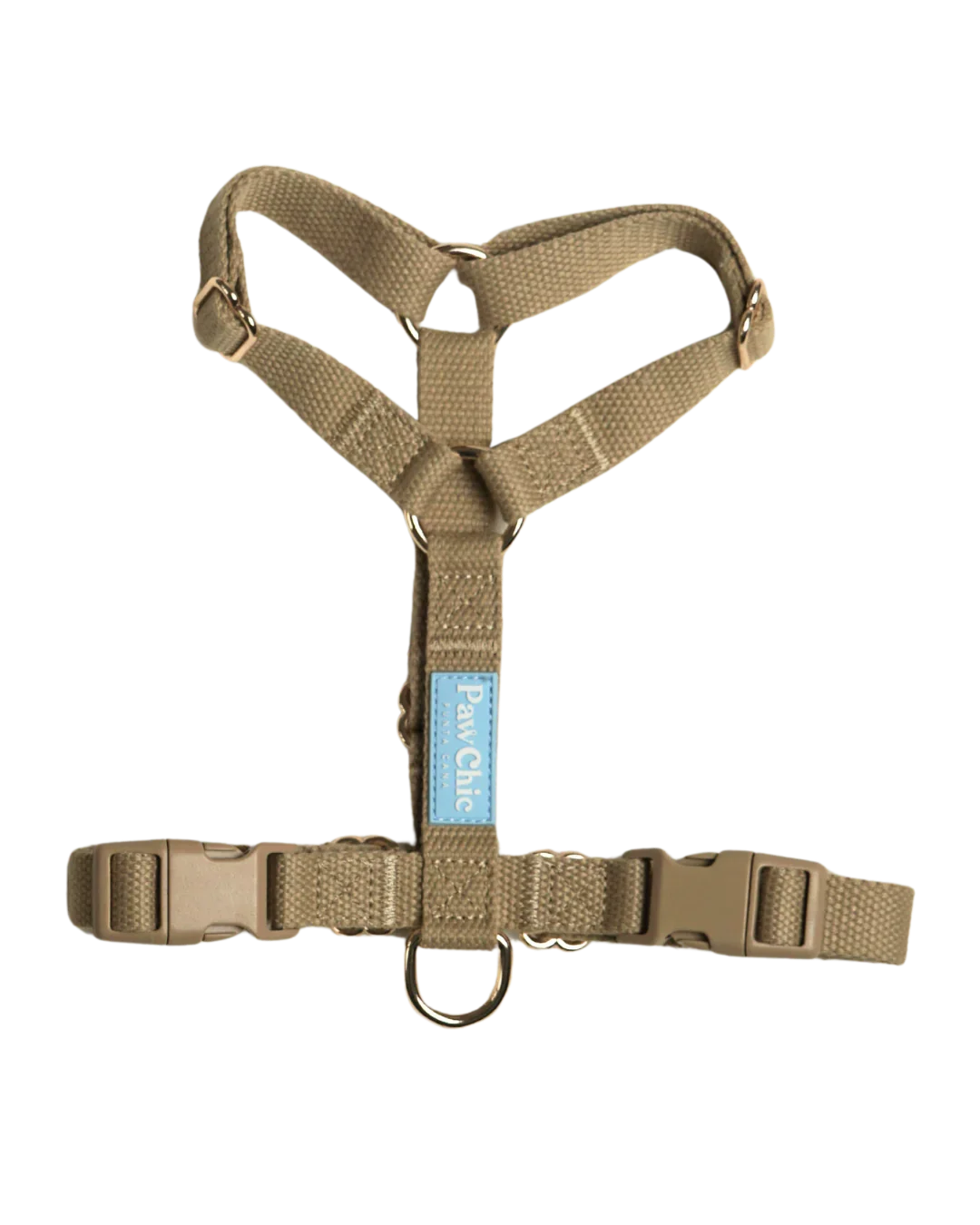 Beige adjustable dog harness with quick-release buckles and metal D-ring for leash attachment
